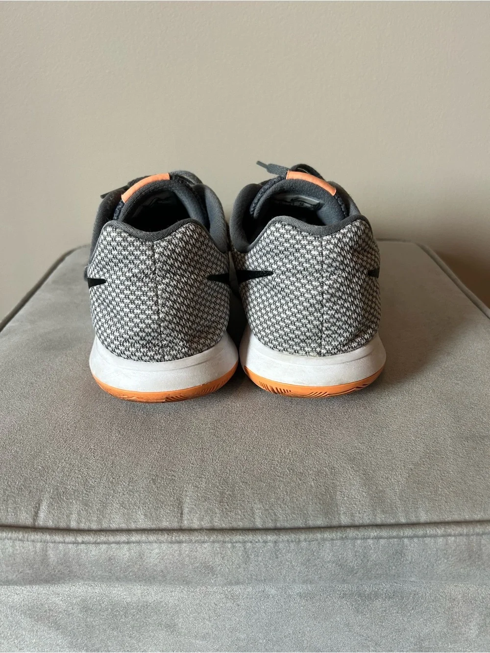 Nike women’s Gray & Black Mesh Sneakers with Orange Accents